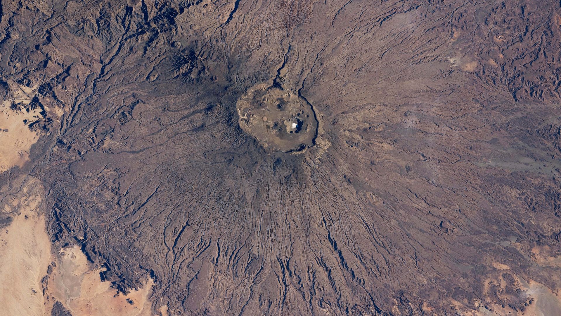 A surprising slab of salt shines at the summit of the Sahara’s tallest peak