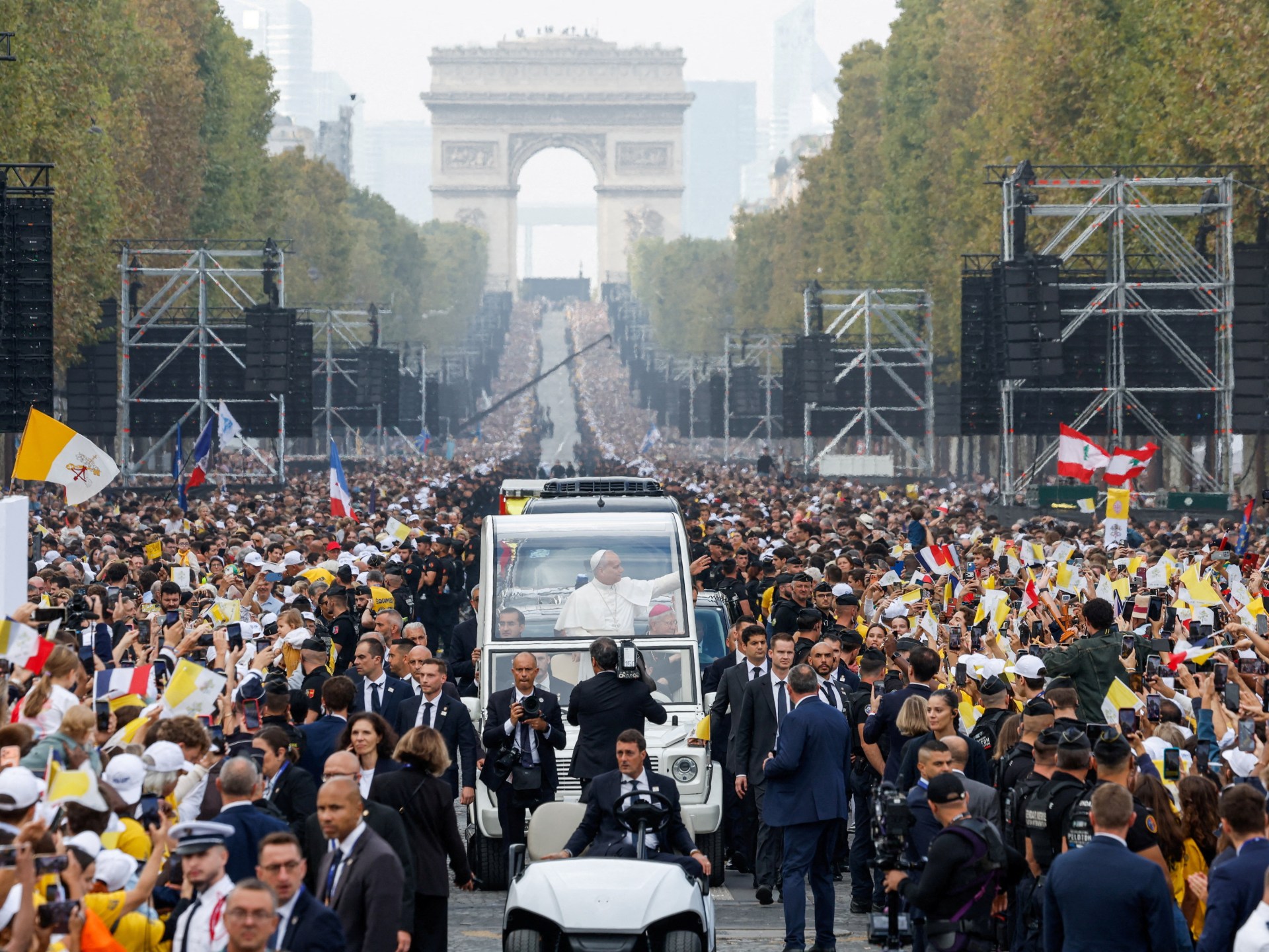 Huge crowds cheer Pope Leo as he leads open-air Mass in Paris