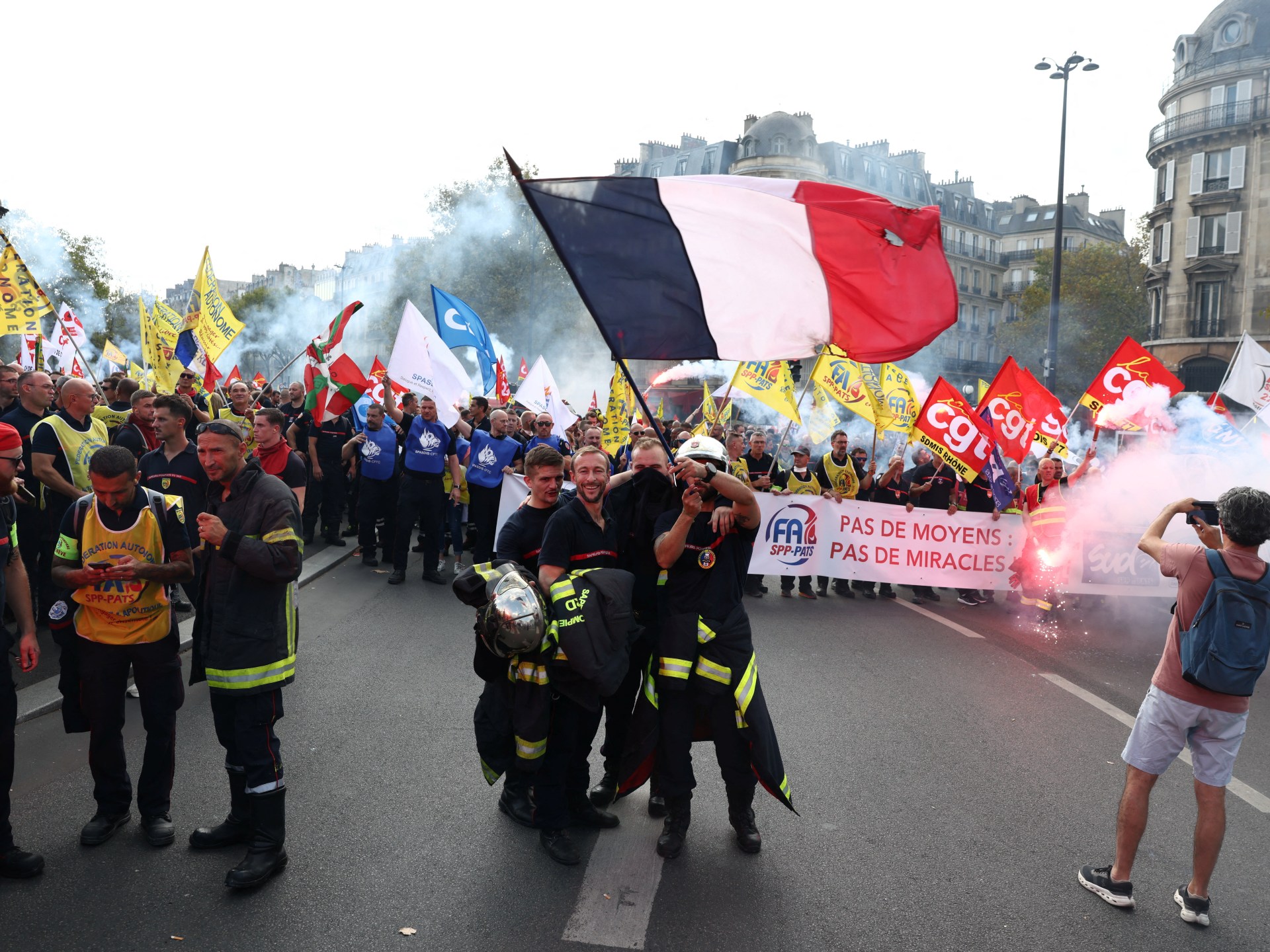 Photos: French students protest, public workers strike before budget cuts