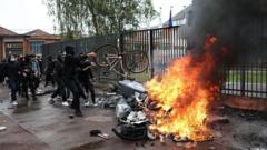 Dozens hurt and hundreds arrested in wave of French school protests
