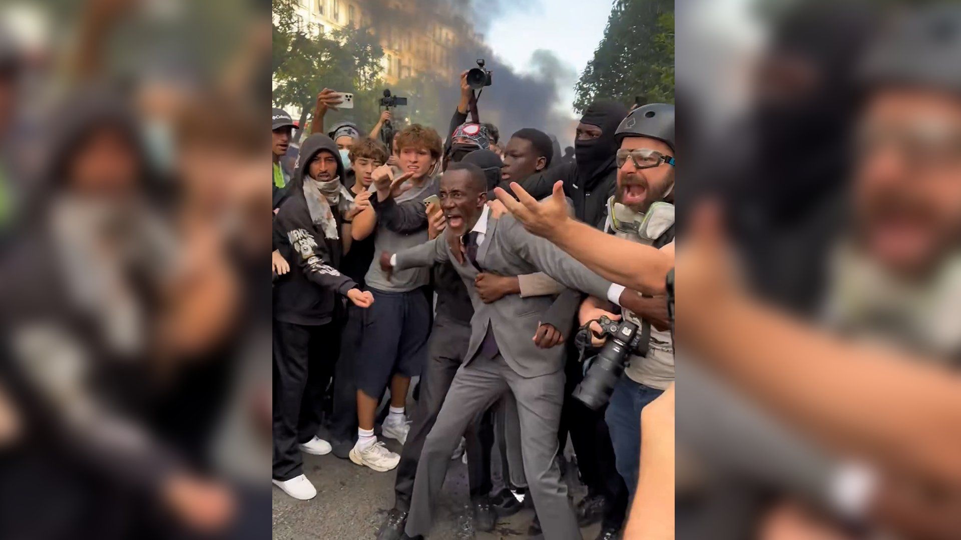 French mayor tear-gassed after shielding protesters from police