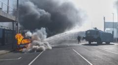 Cars torched and shops looted as anti-migrant violence erupts in South Africa