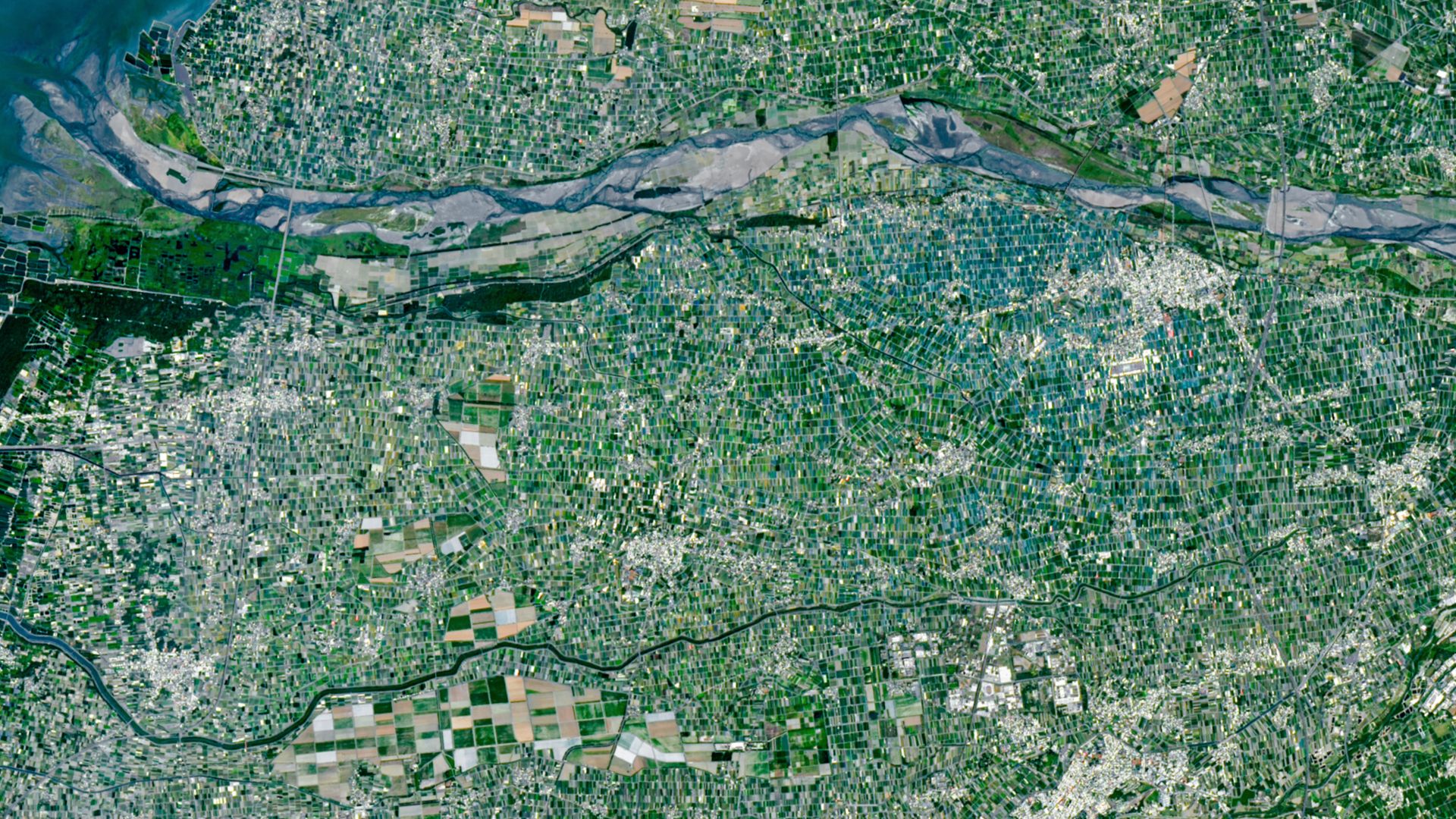 Multicolored ‘mosaic’ of mini farms surrounds Taiwan’s largest river — Earth from space
