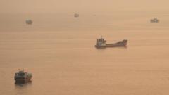 Container ship hit by projectile sinks in Strait of Hormuz, Singapore says