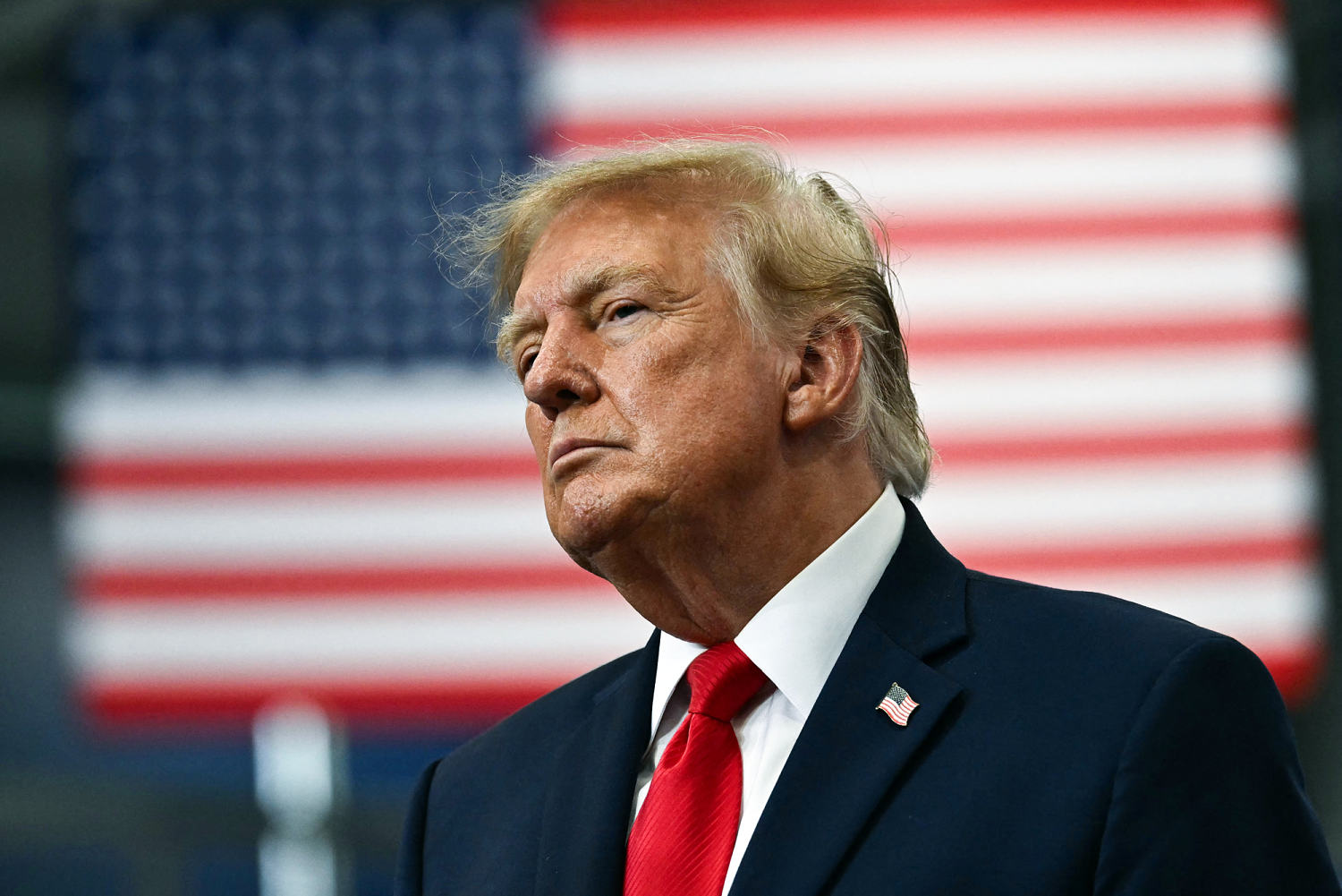 Trump waives new Russia sanctions passed by Congress, citing ‘national interests’