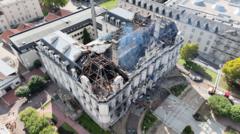 Suspect arrested after historic town hall set alight during disorder – French media