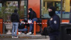 Deadly shooting near Paris is a ‘racist terrorist attack’, Macron says
